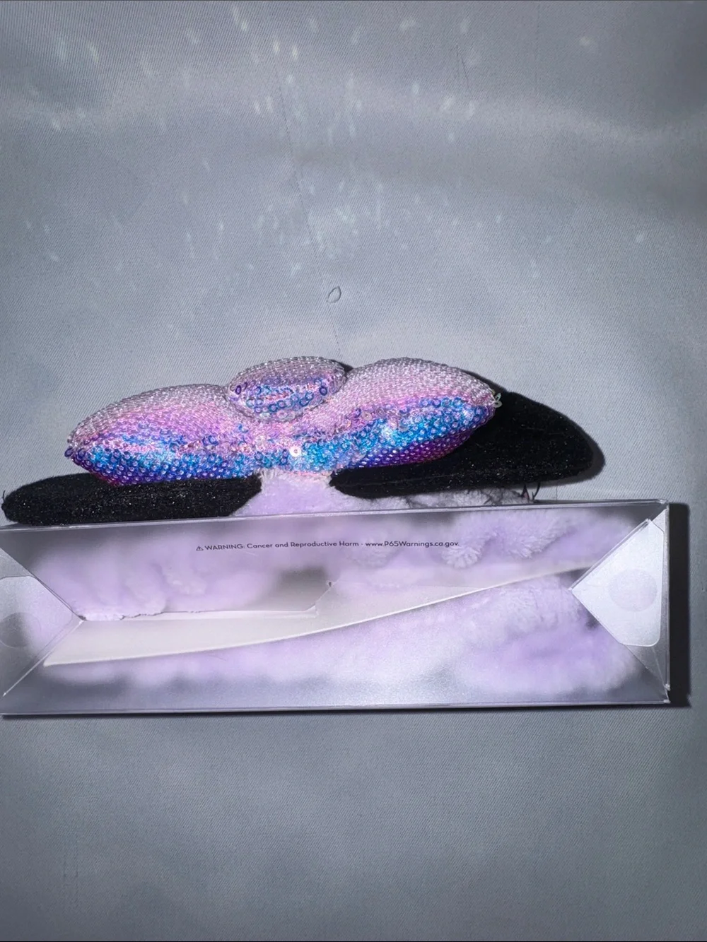 Disney/The Crème Shop Iridescent Pink/ Lavender Sequin Bow Minnie Ears Headband